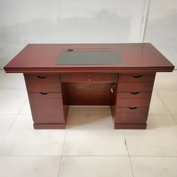 The 1400mm Executive Office Desk at Furniture  Choice Kenya Nairobi  is an Executive Office Desk  with Three drawers. It has a sleek Mahogany Feel and Color. Shop Online for free delivery within Nairobi